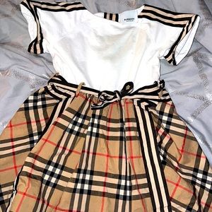 Hello I am selling this very gorgeous Burberry dress. You will love how it looks